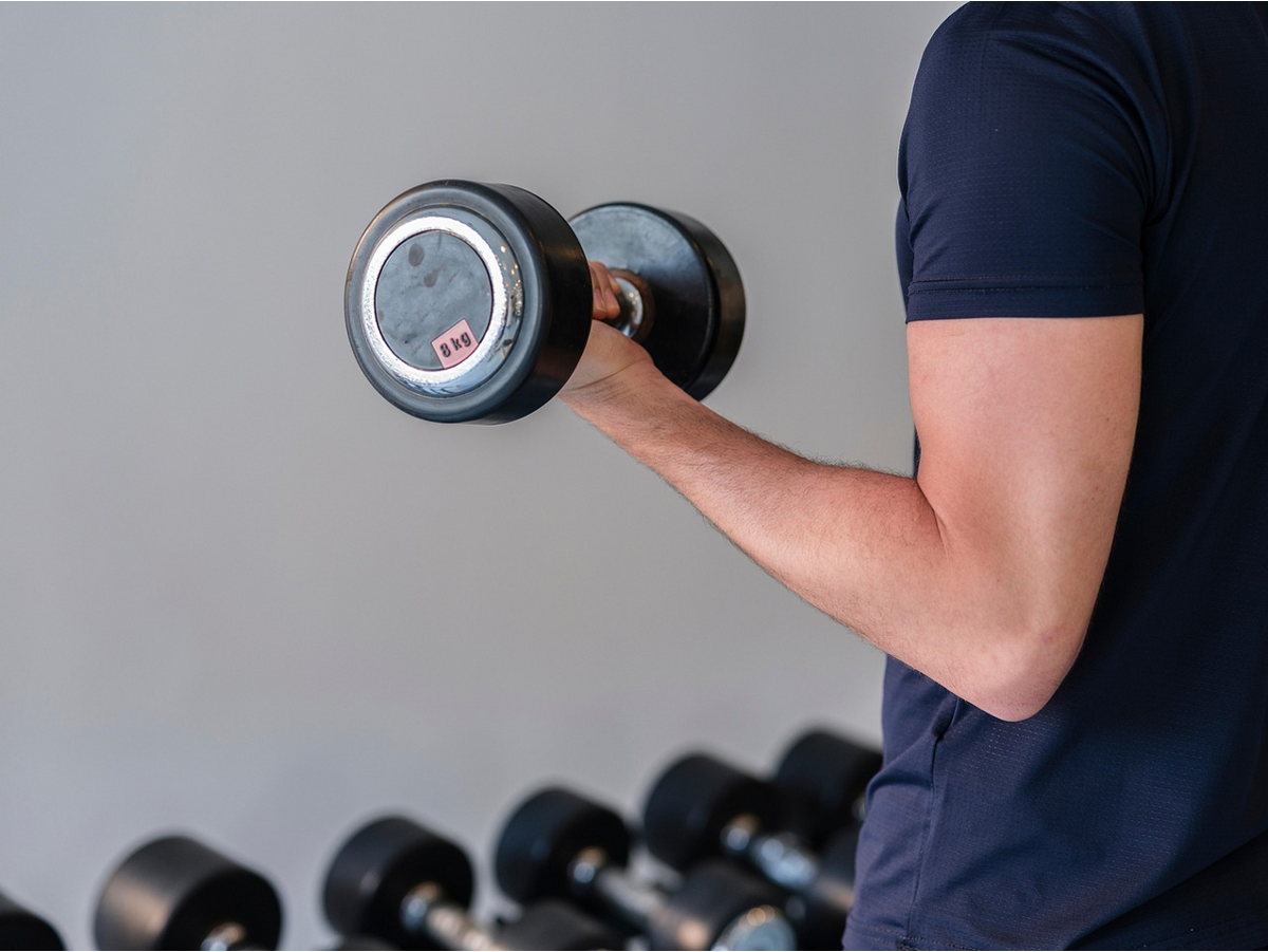 Tricep Extensions vs Kickbacks: Benefits & Differences