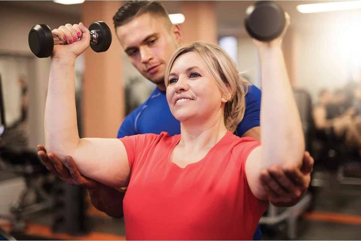 Dumbbell Shoulder Press vs Overhead Press: Differences & Muscles Worked