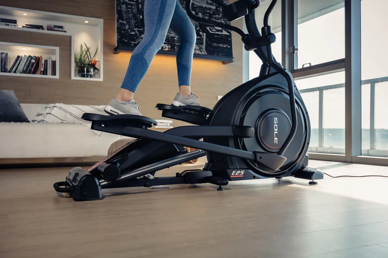 Closeup of a woman’s legs on a SOLE E25 elliptical