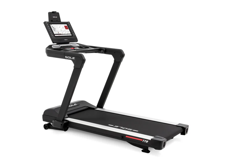 Sleek SOLE TT8 treadmill with modern touchscreen display, showcasing sturdy design and spacious running surface.