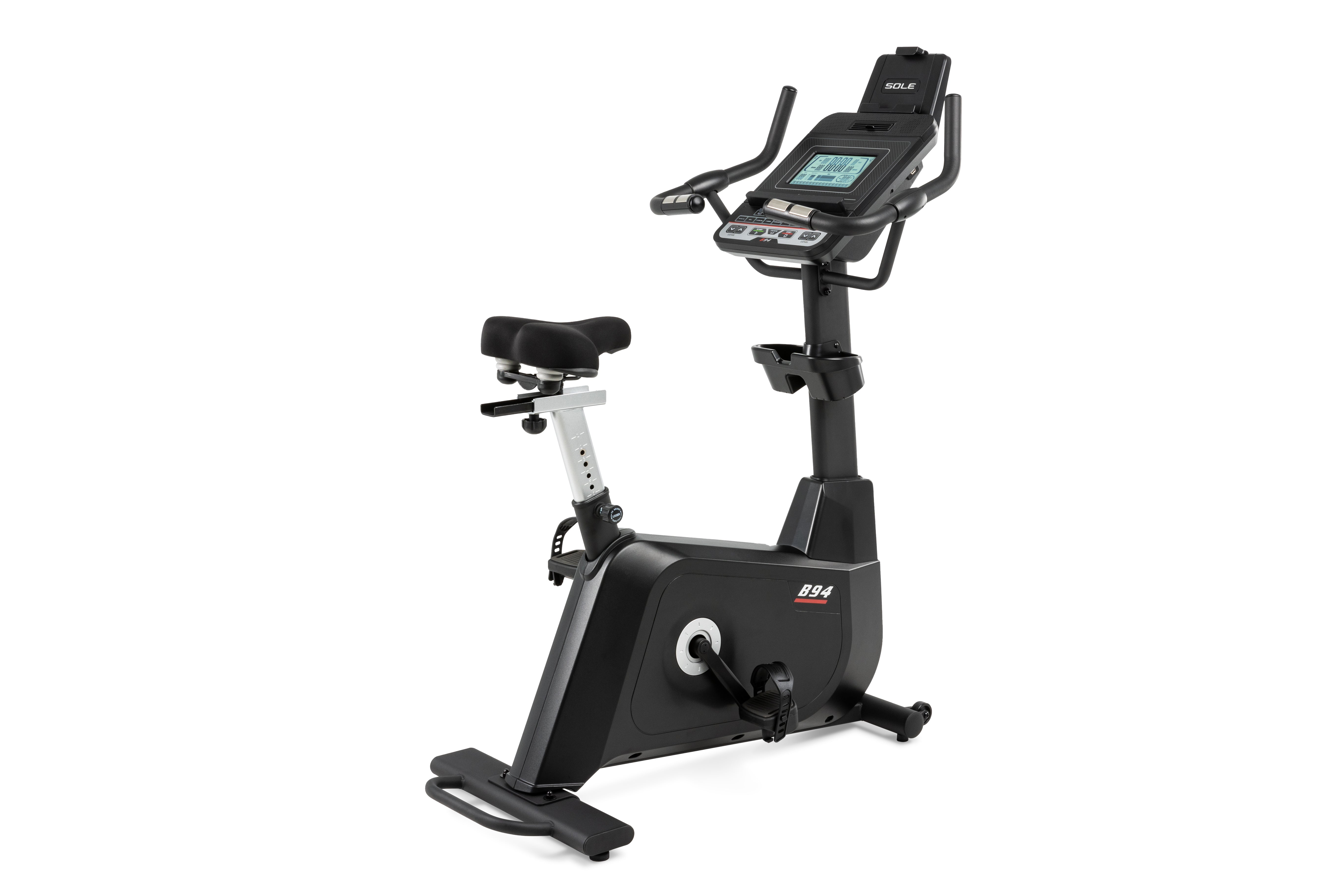 Sole B94 upright exercise bike with digital console and adjustable seat.