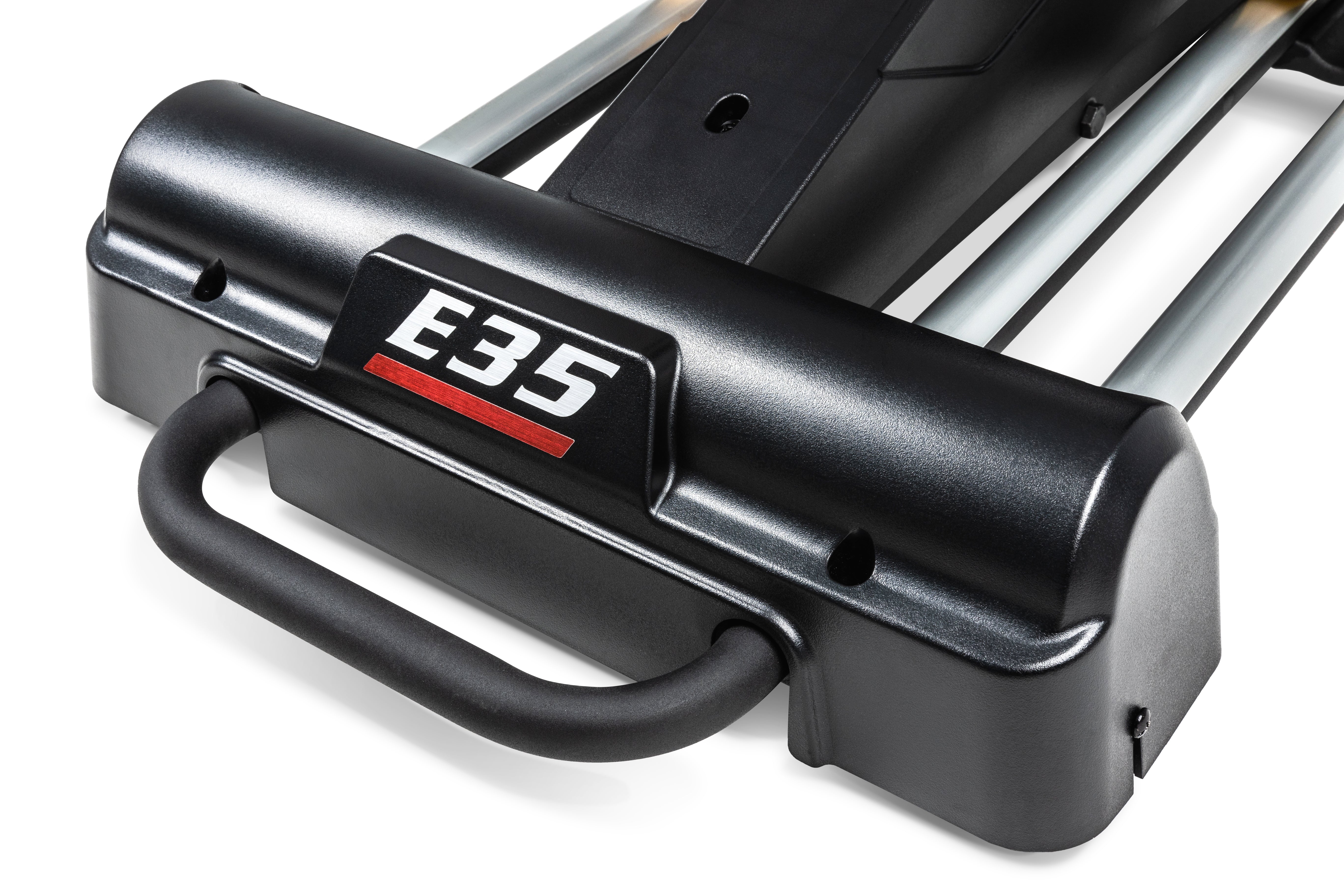 Close-up of the Sole E35 elliptical trainer's base, showing the "E35" logo, a handle, and part of its rail system.
