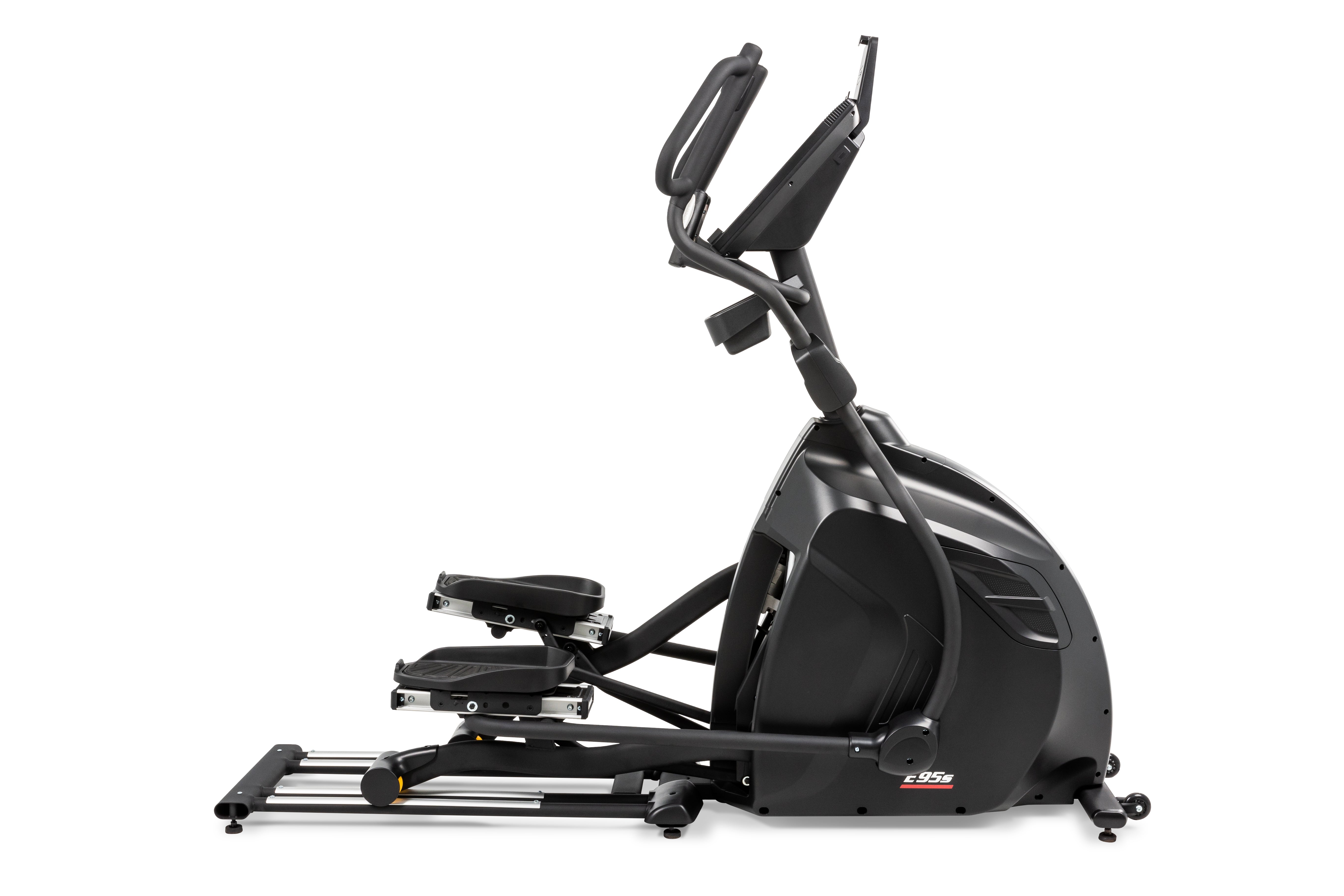 Side profile of the Sole E95S elliptical machine showcasing its sleek black design, adjustable foot pedals, curved handlebars, a prominent digital display panel, and a sturdy base with a yellow folding release lever and wheels for mobility.