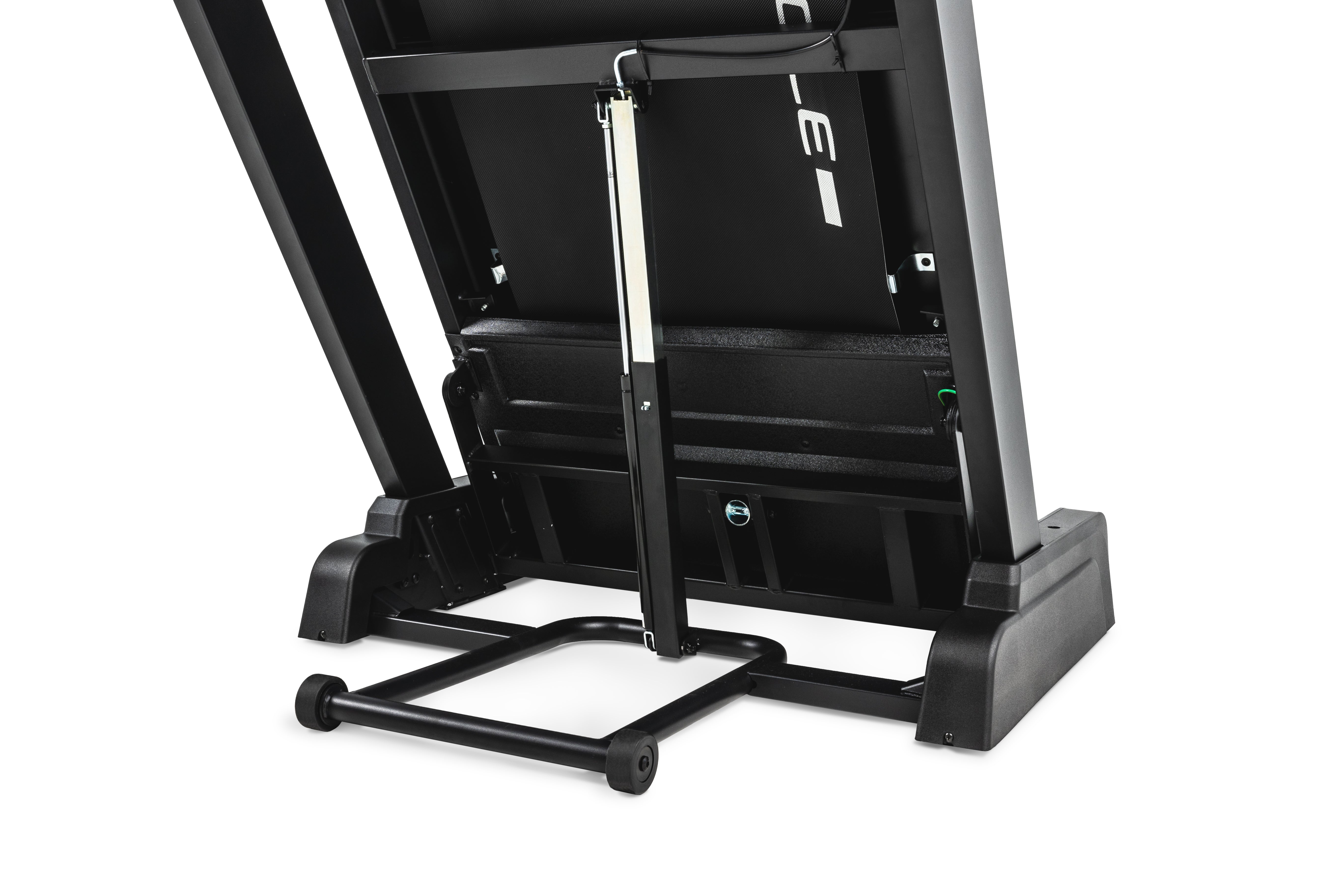 Rear view of the Sole F80 treadmill, focusing on the folded deck mechanism with a metal support bar, the textured black surface with 'F80' branding, and the sturdy base with transport wheels.