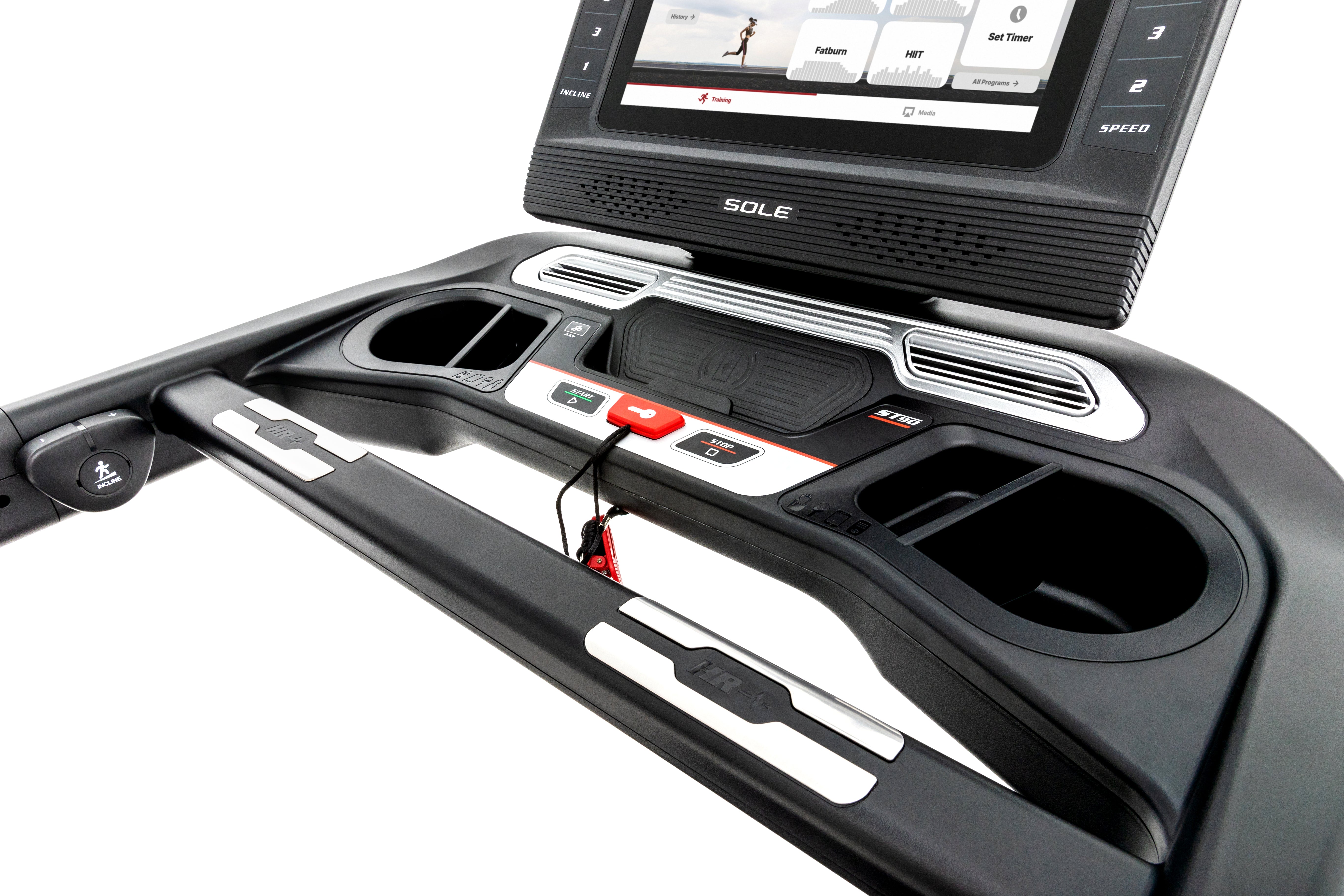 Angled view of the Sole ST90 treadmill's control panel, featuring a digital screen displaying a running feedback, tactile start and stop buttons, cup holders, and the safety key attachment on a sleek black design with silver accents.