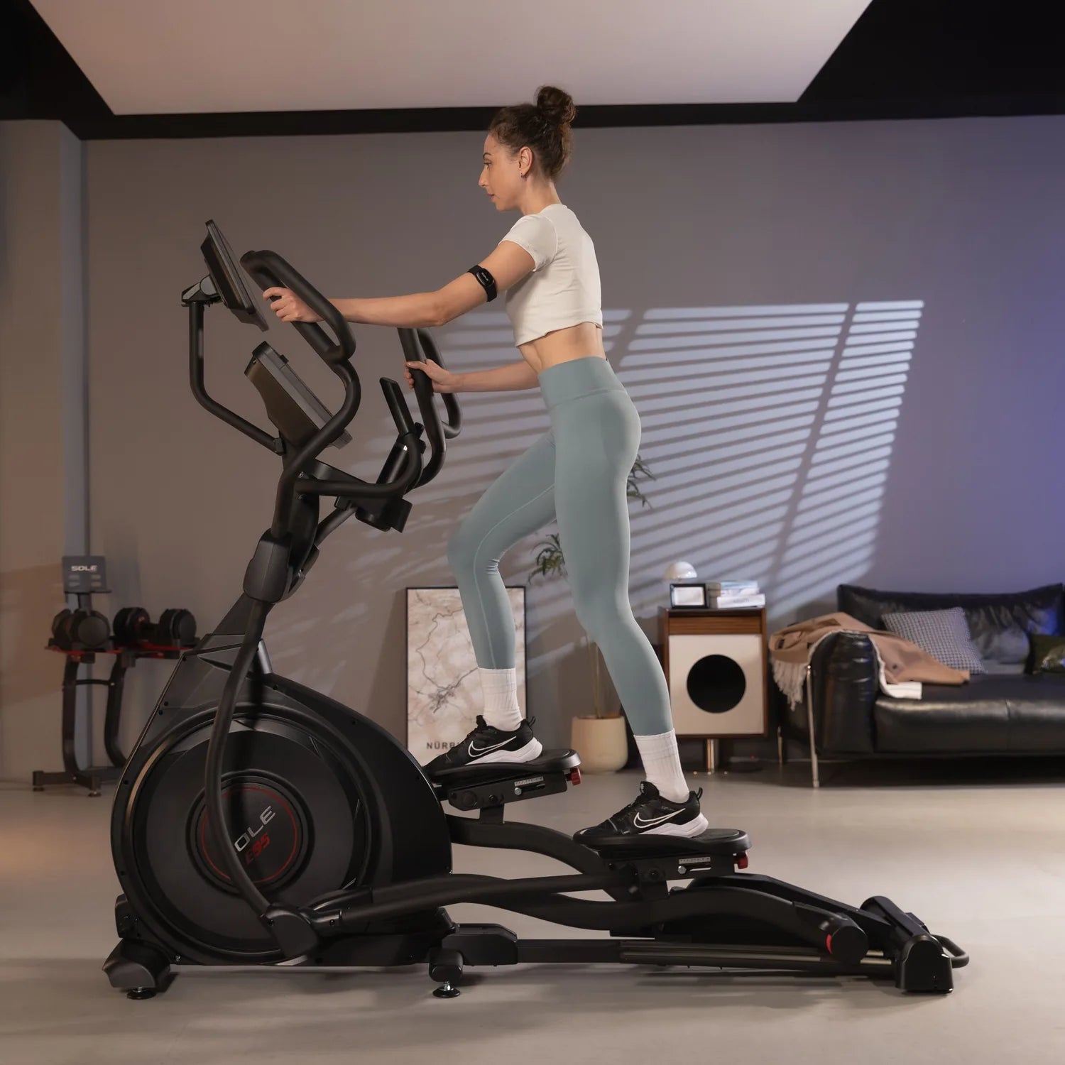 SOLE E95 Elliptical in a home setting