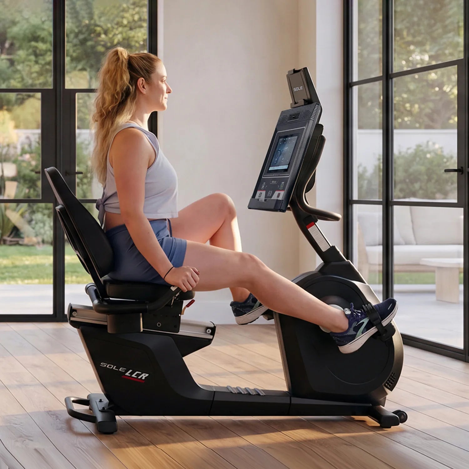 SOLE LCR Exercise Bike in a home setting