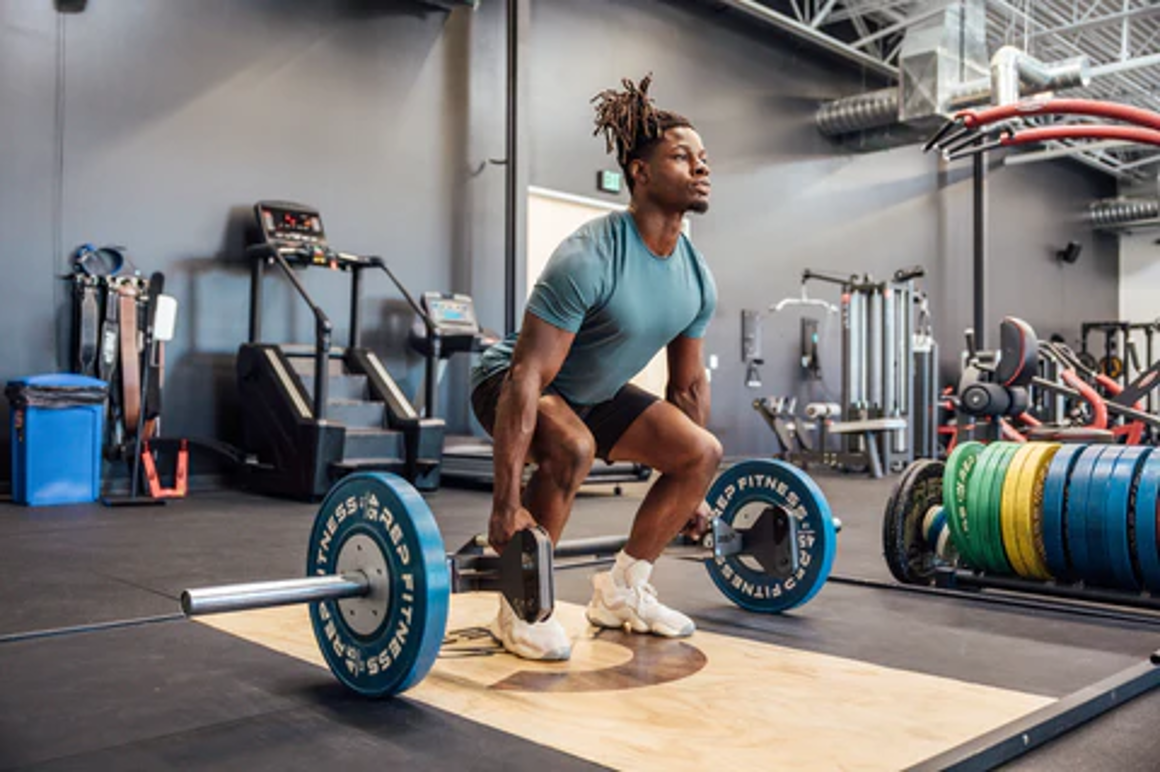 Trap Bar Deadlift Vs Romanian: Benefits, Muscles Worked & Weight Consideration