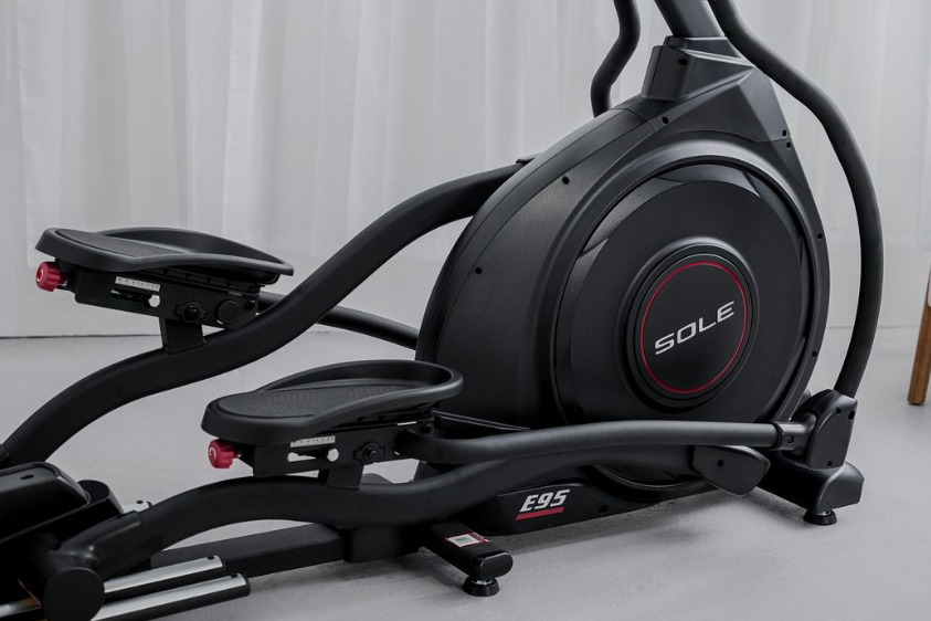 Close-up of SOLE E95 Elliptical machine, showcasing sturdy build and whisper-quiet drive system