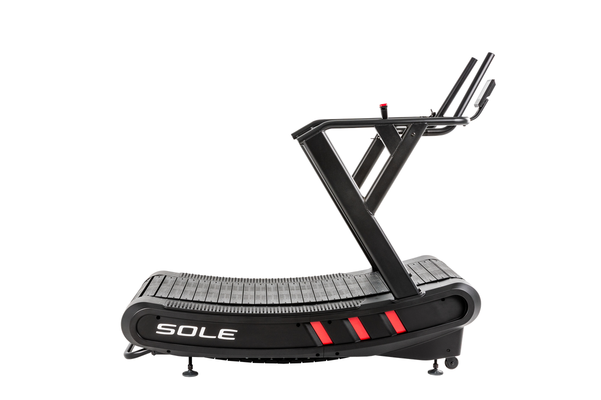 SOLE C80 non-motorized curved treadmill in matte black with red accent stripes, concave slatted running deck, and upright dual-handlebar frame.