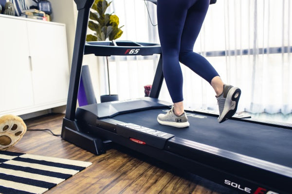 a person walking on a treadmill