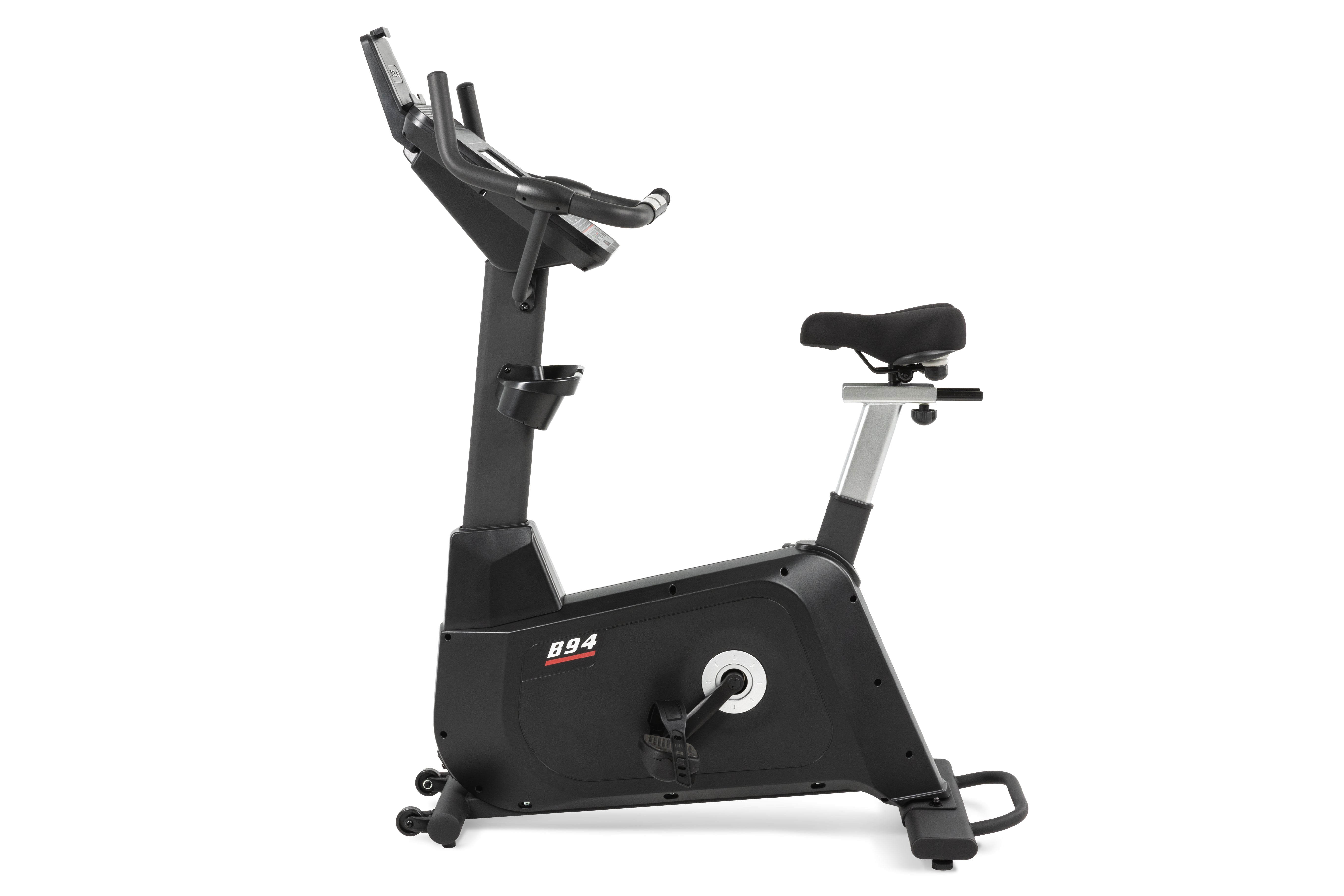 Sole B94 exercise bike with a modern design, showcasing a digital display panel, ergonomic handlebars, adjustable cushioned seat, and a sturdy base with rolling wheels.