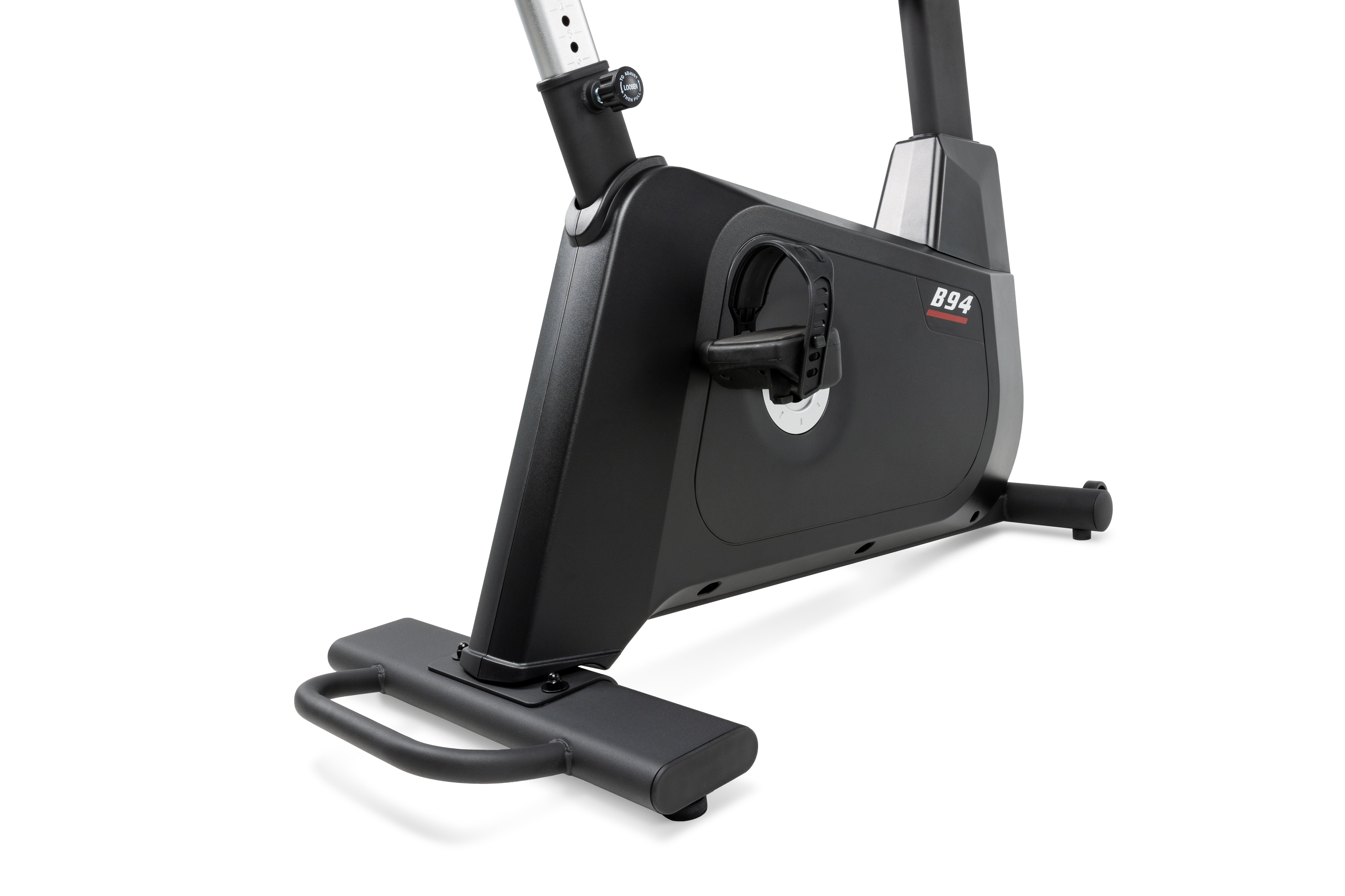 Sole B94 exercise bike showing its sleek black design, including the adjustable height mechanism, a handle, and a prominent 'B94' logo on the side.