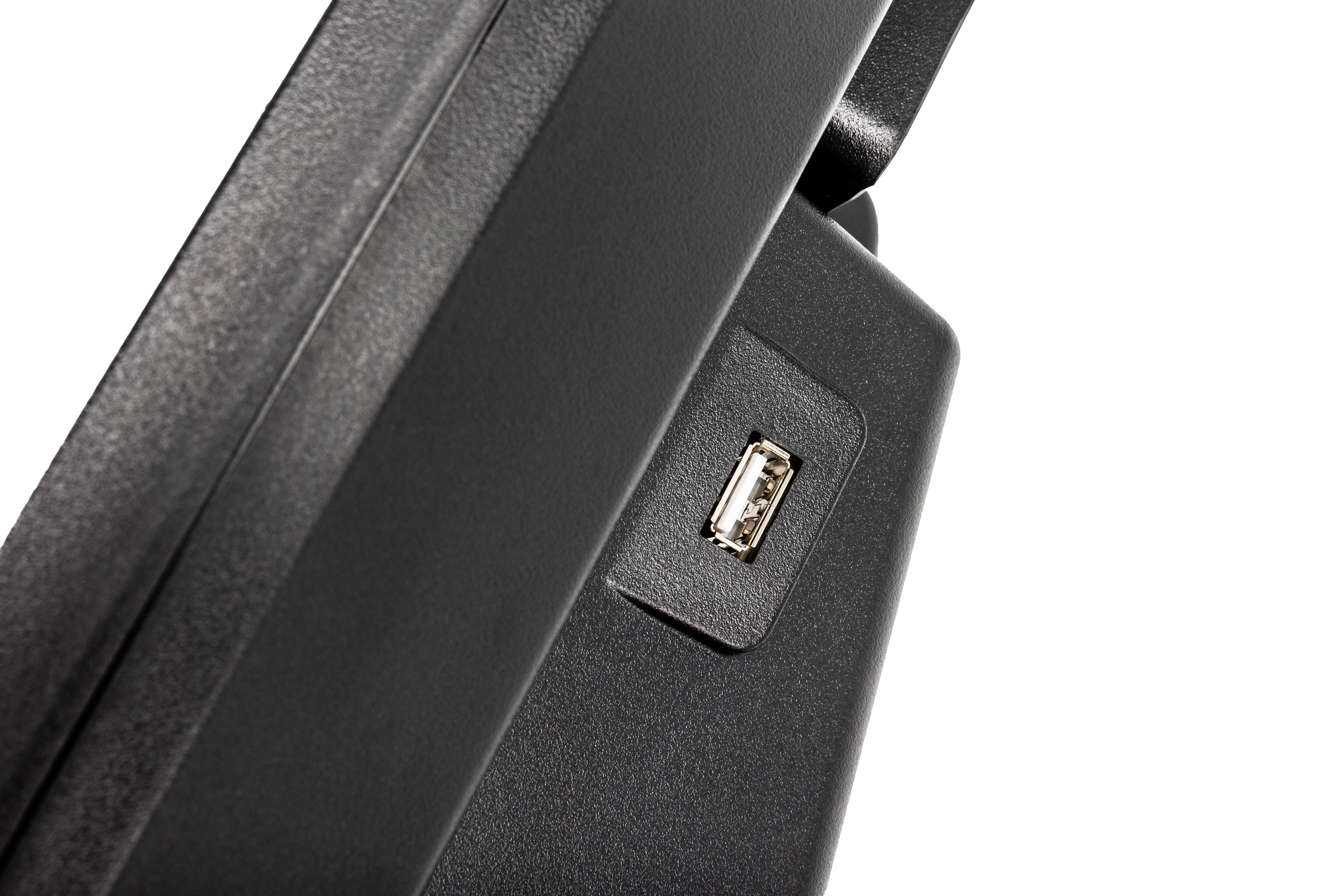 Close-up view of the Sole E25 elliptical trainer's side, showing a textured matte finish and an integrated USB port.