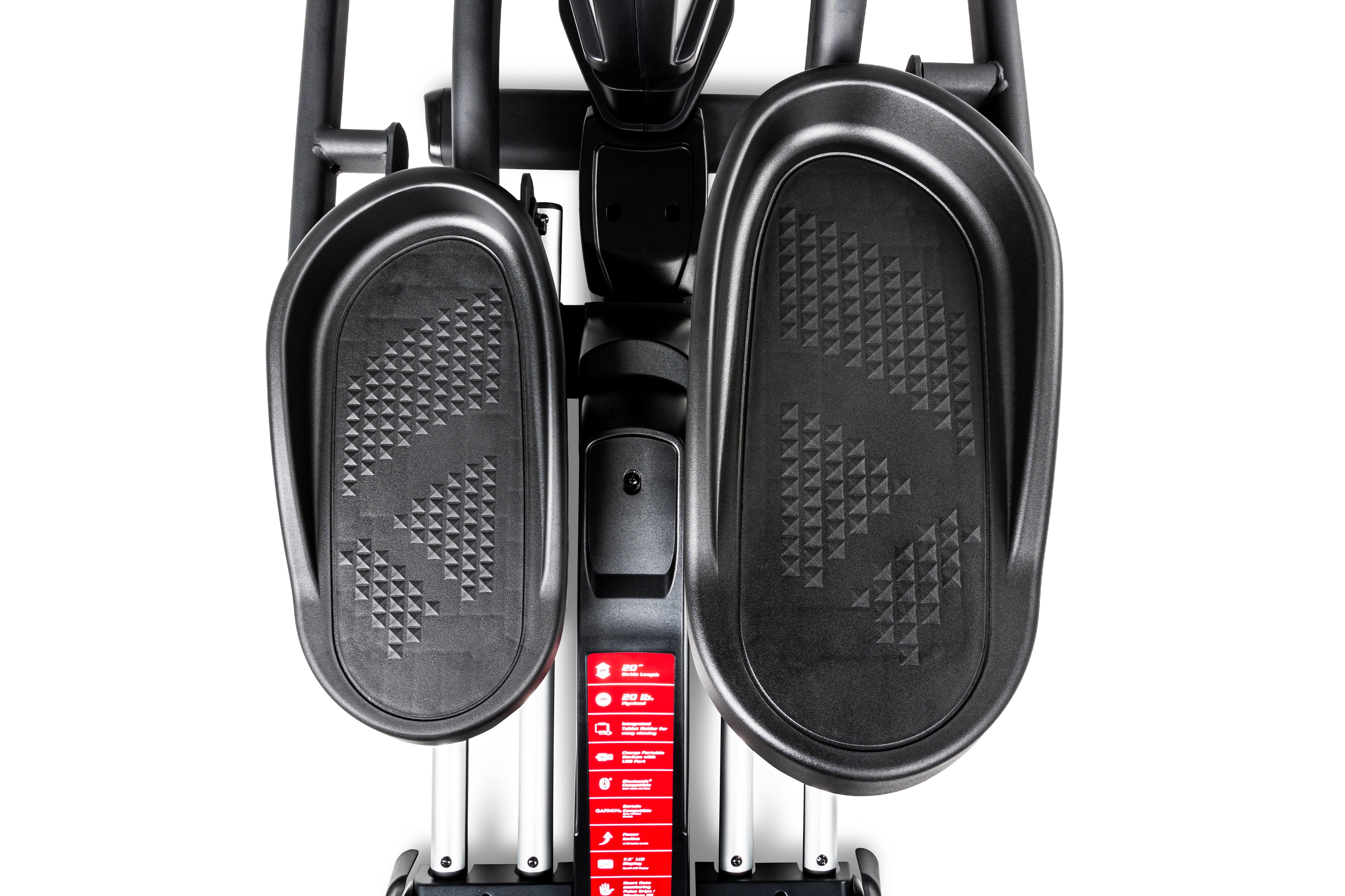 Top-down view of the Sole E25 elliptical trainer showcasing its textured foot pedals, central column, and a red labeled resistance adjustment strip.