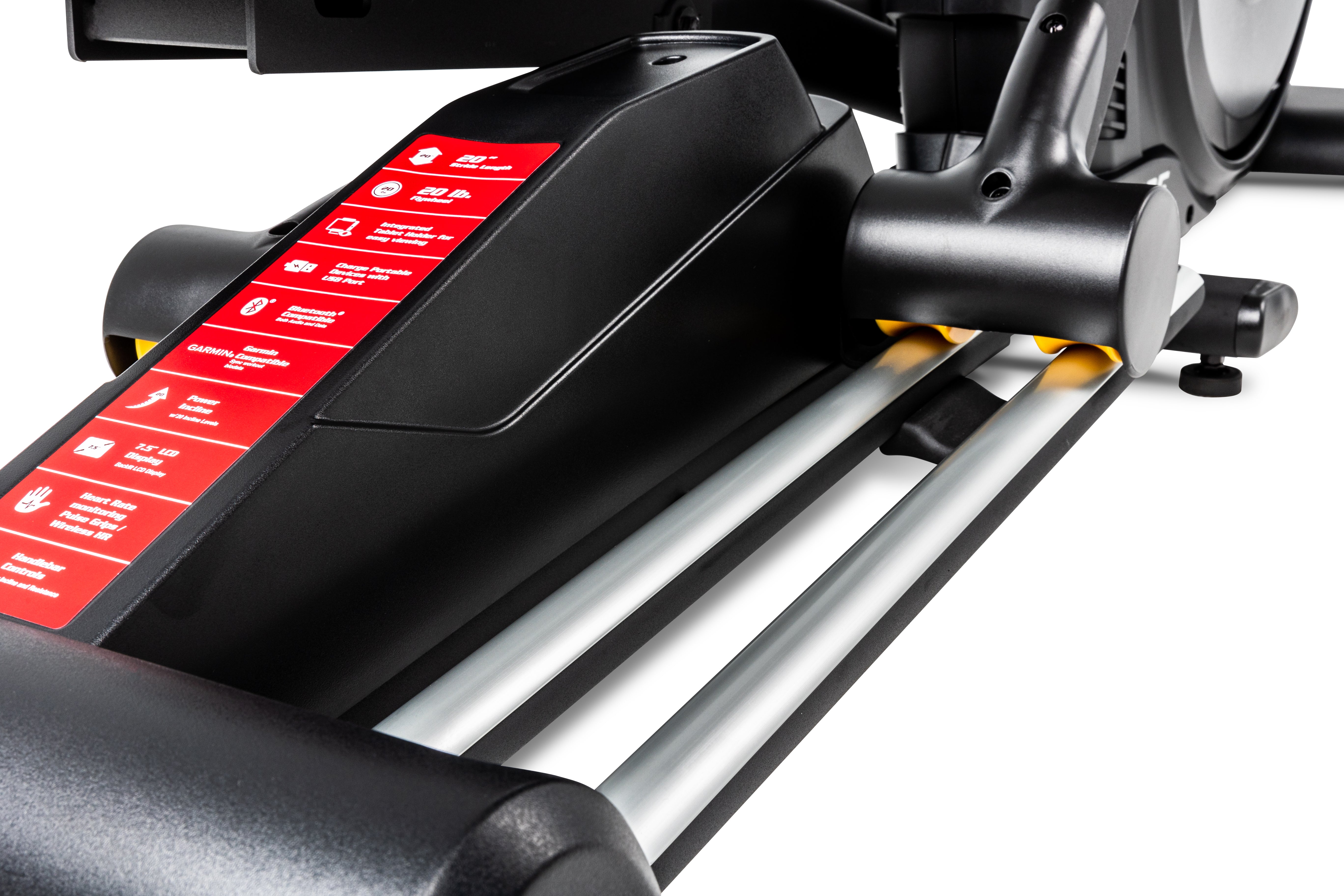 Close-up view of the Sole E25 elliptical machine, showcasing its control panel with red labeled buttons, black body, silver rails, and yellow accents on the joints.