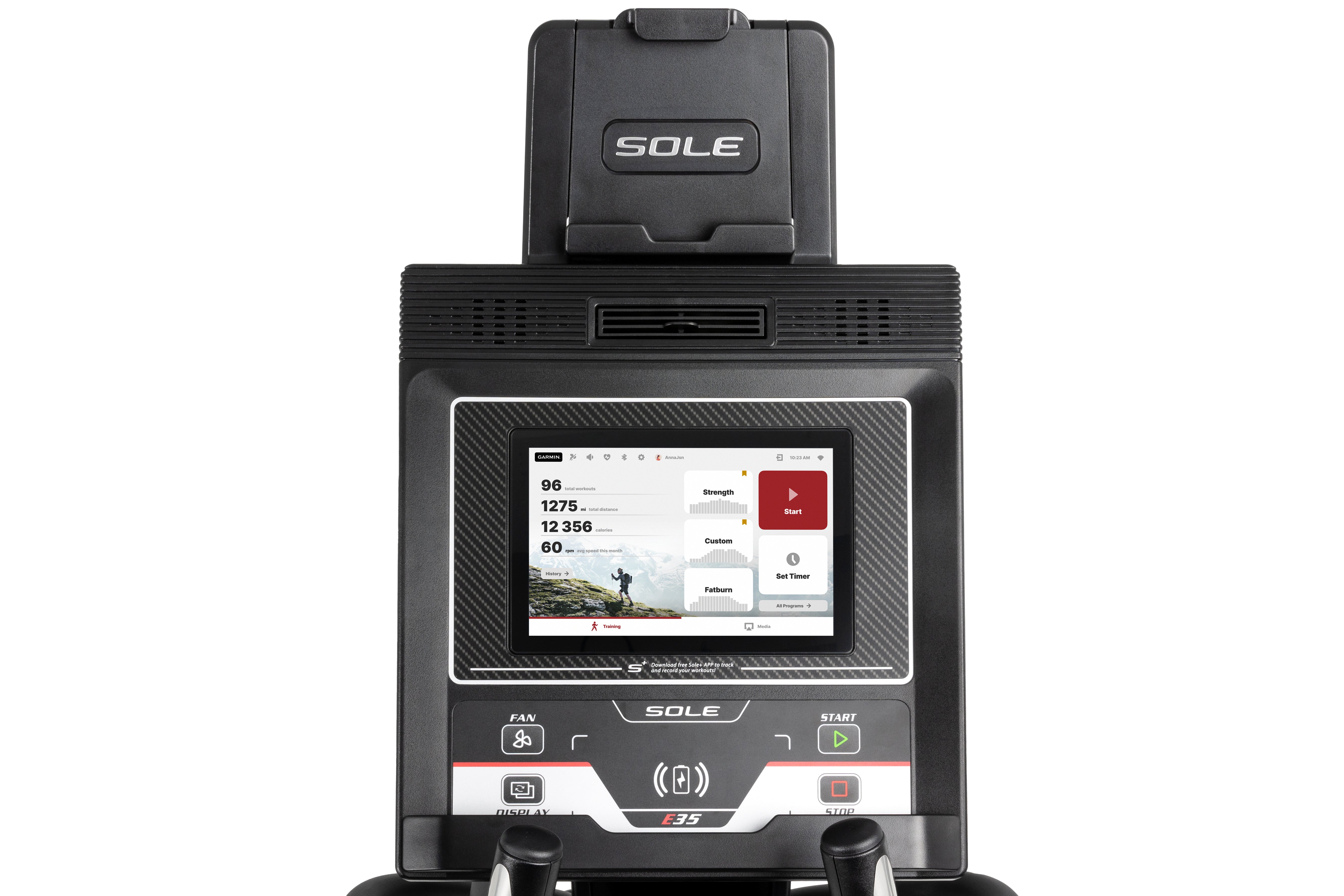 Front view of the Sole E35 elliptical's console, featuring a large digital touchscreen display that showcases workout metrics and a scenic running trail. The top houses a branded 'SOLE' tablet holder. The lower section displays easy-to-access buttons labeled 'START', 'STOP', and other controls, framed by a fan symbol and the 'E35' logo.