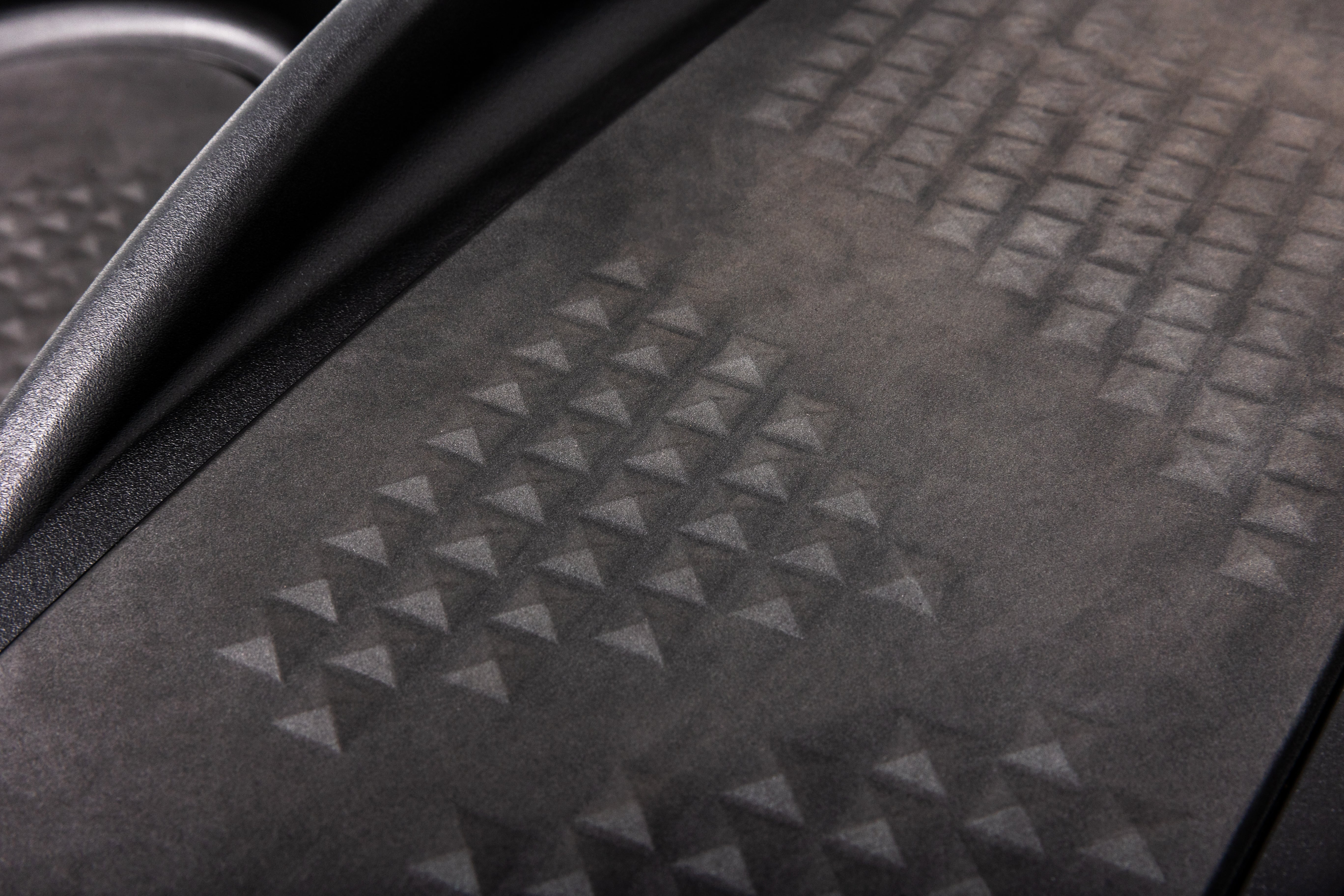 Detail shot of the Sole E95 elliptical machine's textured and cushioned footpad.