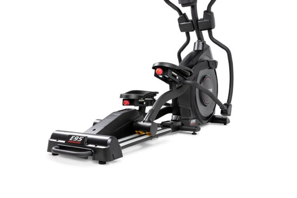a black exercise machine with a white background
