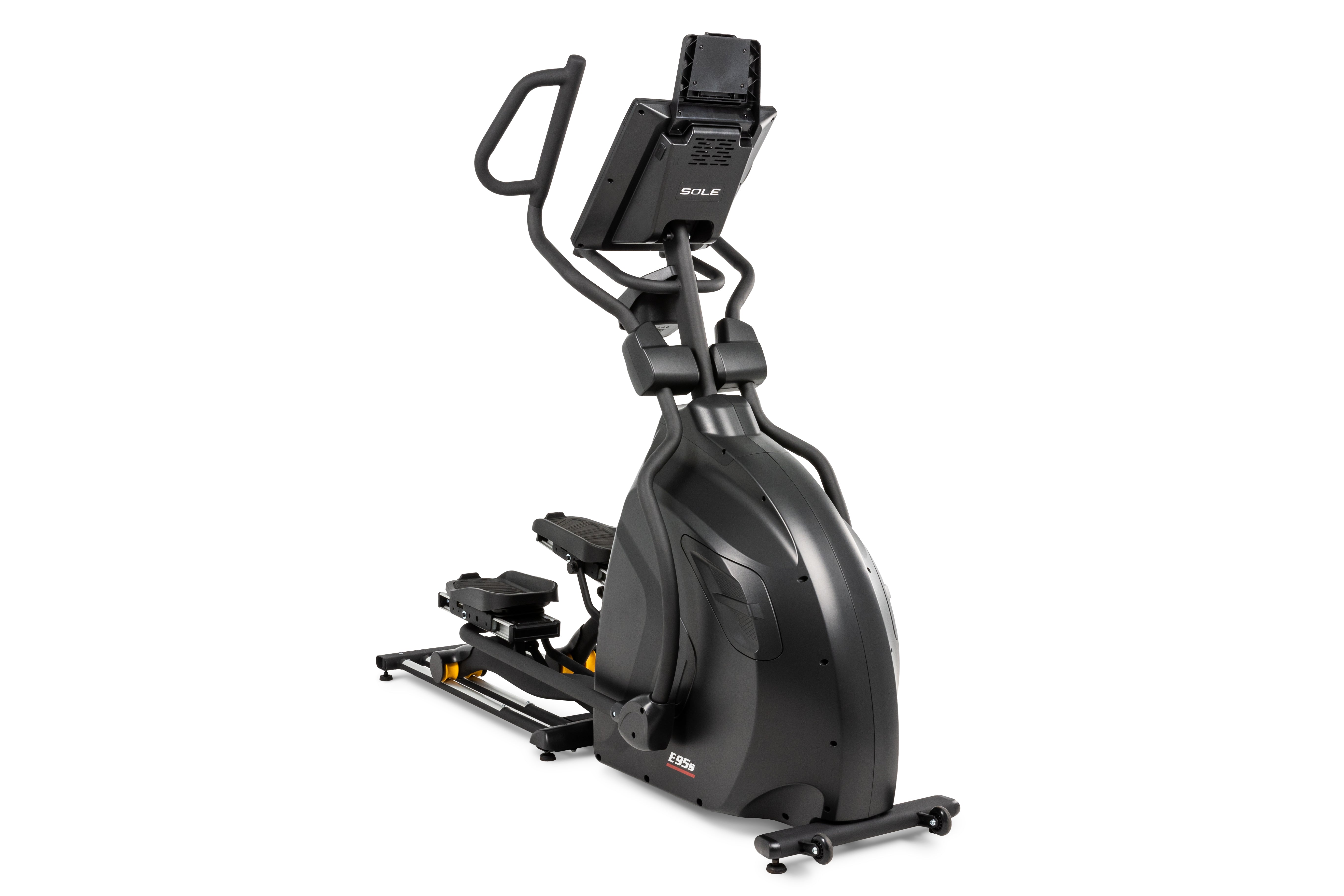 Side view of the Sole E95S elliptical machine in a matte grey finish, featuring a digital display with the SOLE logo, ergonomic handlebars, adjustable foot pedals, and a base with a yellow folding release lever and smooth-rolling wheels for easy movement.