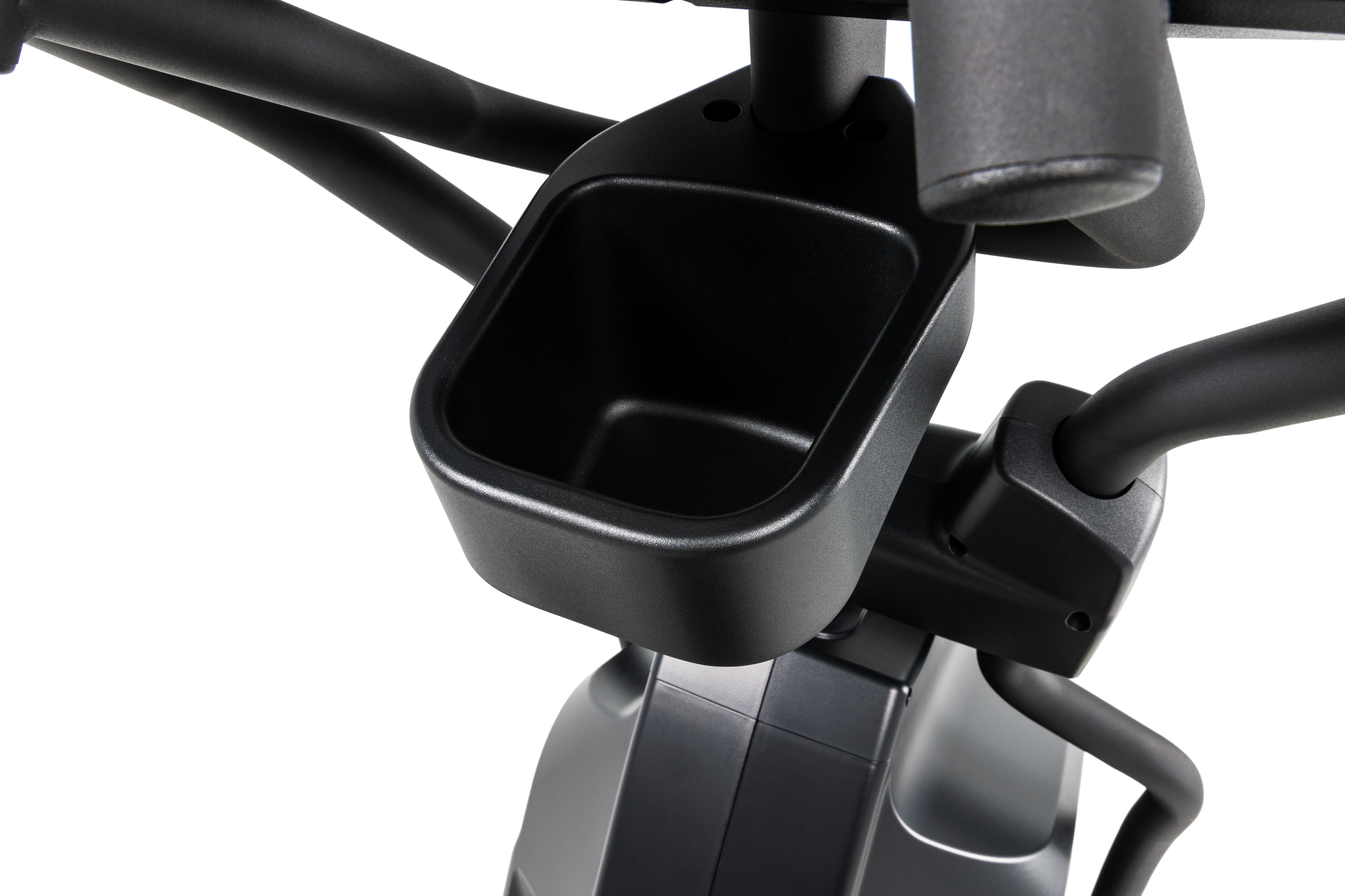 Close-up of the Sole E95S elliptical machine's handle and accessory holder, showcasing the matte black finish, storage compartment, and a portion of the machine's frame.