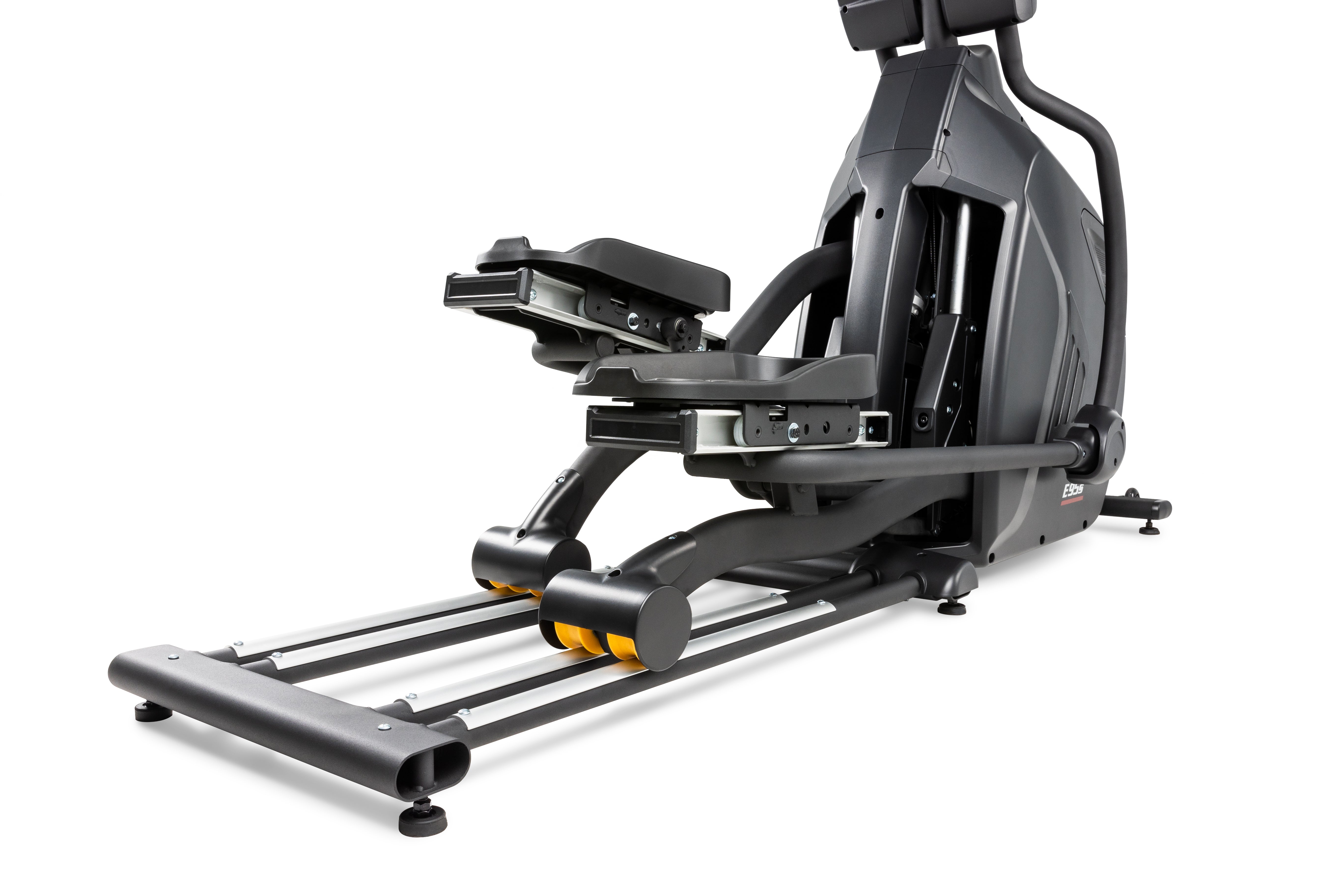 Side profile of the Sole E95S elliptical machine showcasing the foot pedals, arm handles, and rear housing unit with logo.