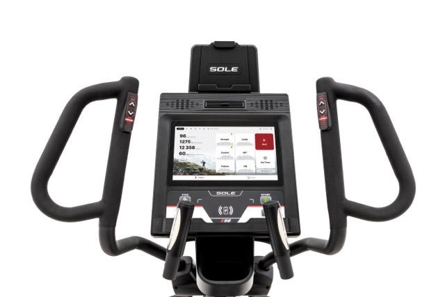 Close-up of the Sole E98 elliptical machine's handlebars, digital display console showcasing fitness metrics, and controls, with the "SOLE" logo prominently displayed on the top and base, set against a white background.