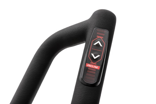 Close-up view of the Sole E98 elliptical machine's black handle, highlighting the red and black "INCLINE" button panel with up and down arrow controls against a white background.