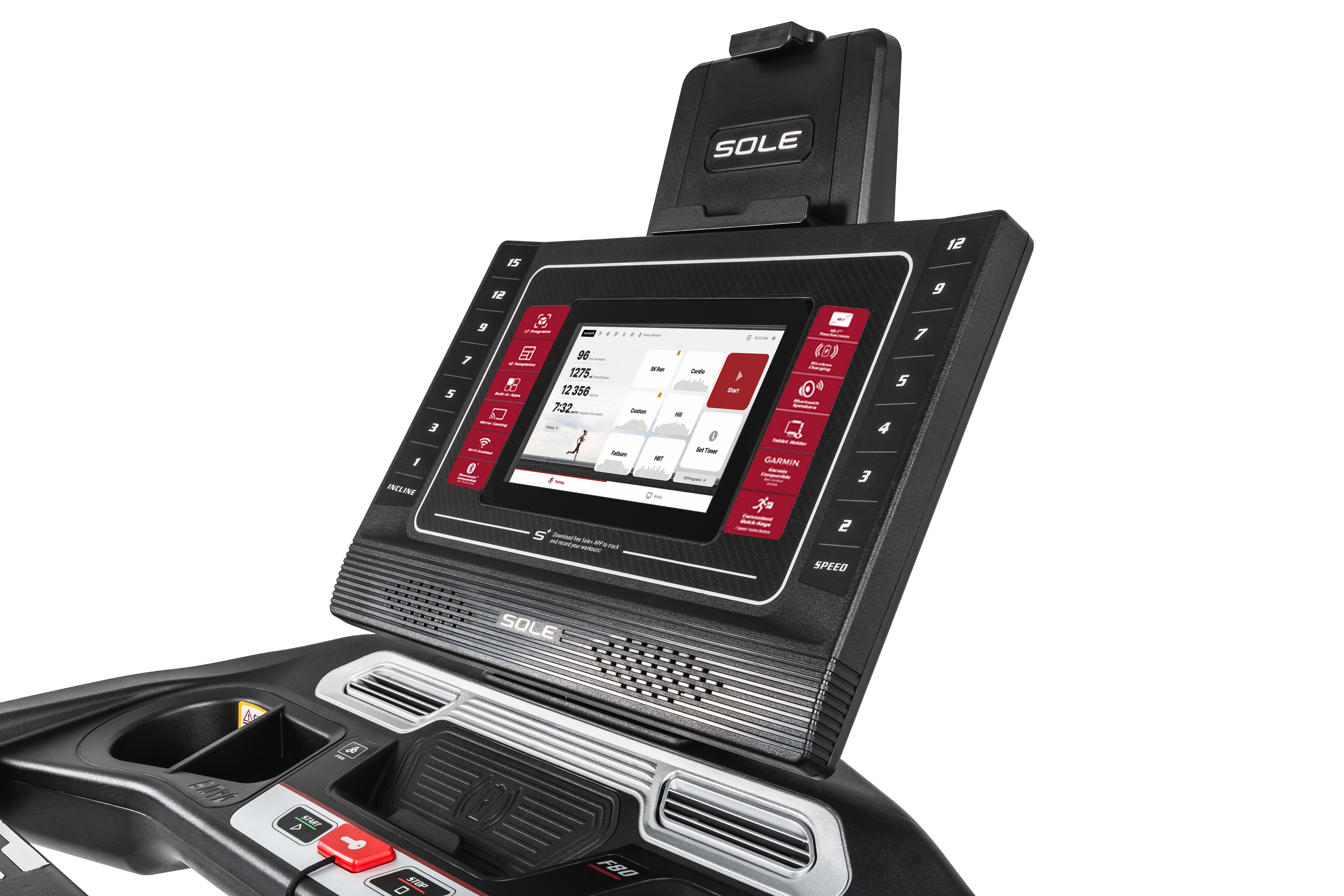 Close-up view of the Sole F80 treadmill's console, featuring a large digital touchscreen displaying workout metrics, side buttons for incline and speed adjustments, the 'SOLE' logo on the tablet holder, and a storage compartment with safety key slot on the lower section.