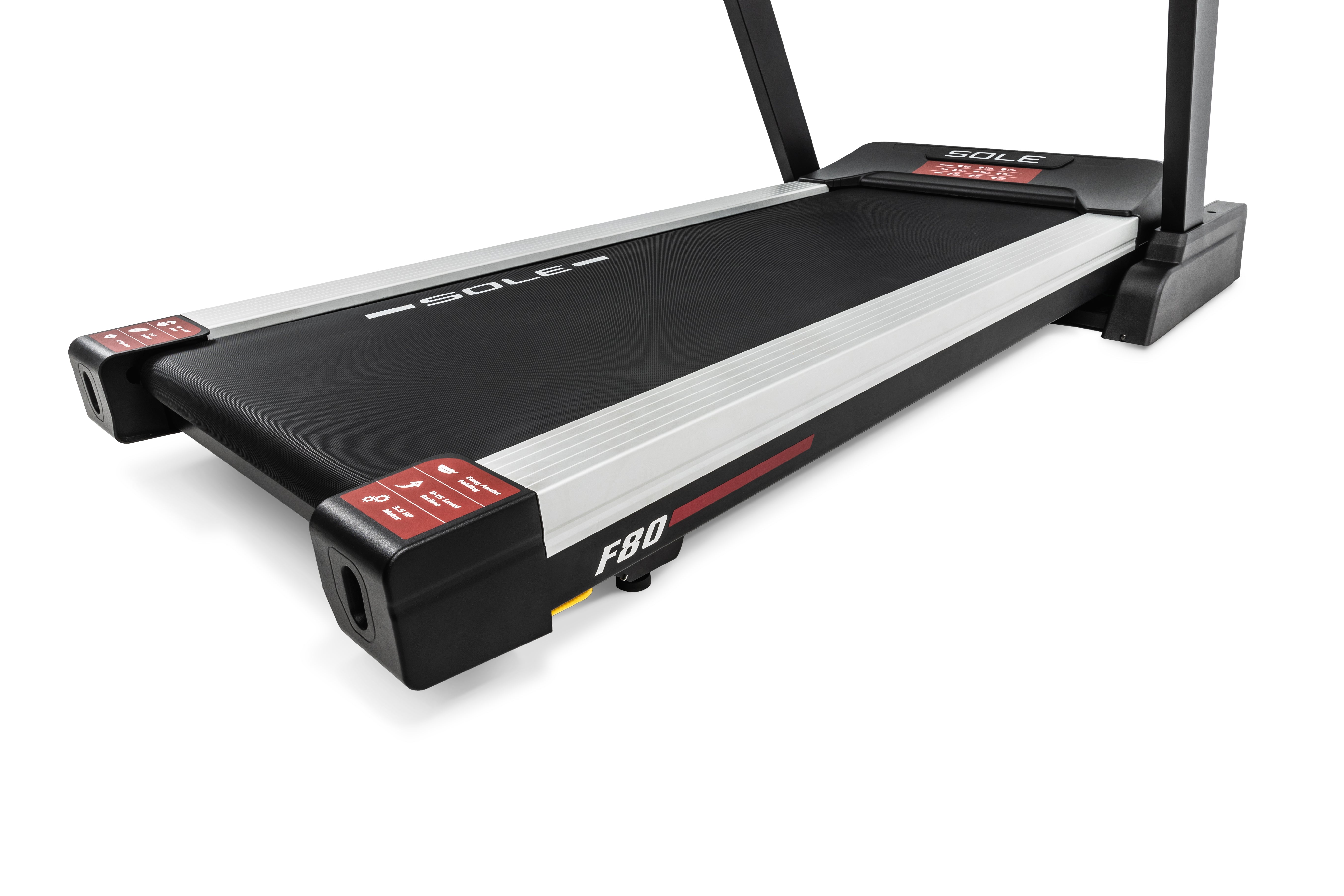 Side view of the Sole F80 treadmill displaying its sleek black design, white side rails, F80 branding, and red warning labels near the front base.