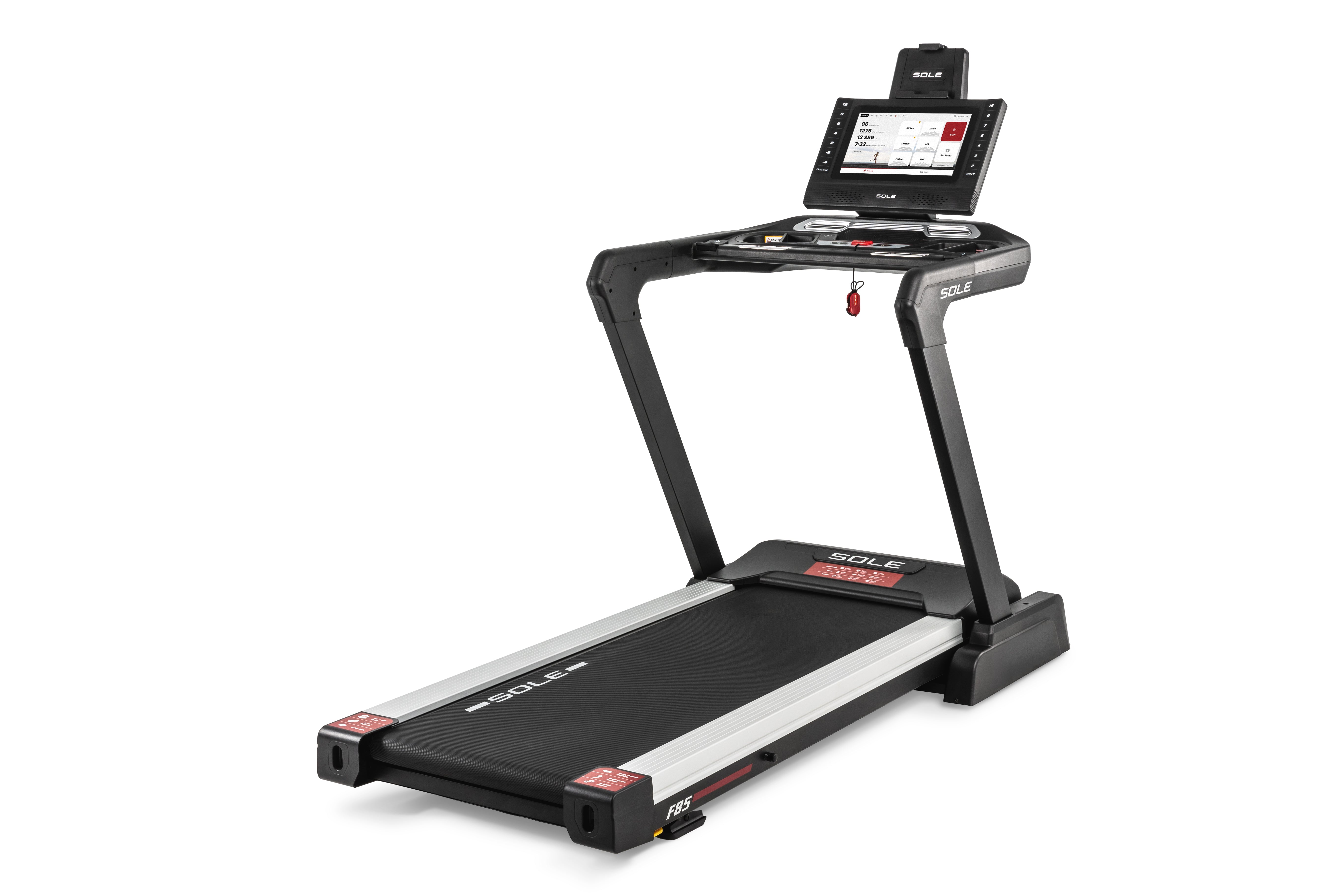Side view of the Sole F85 treadmill featuring a digital display screen at the top, control panel below it, and the "SOLE" branding on the side railings and treadmill deck. The treadmill has a black and gray design with the "F85" logo on the lower front portion. The running surface is black with white and red accents.