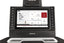 Front view of the Sole F85 treadmill's advanced digital display showcasing workout statistics, selectable training programs like "5K Run" and "HIIT", and touchscreen controls, flanked by incline and speed adjustment buttons, with the SOLE branding visible below the screen and air vents.