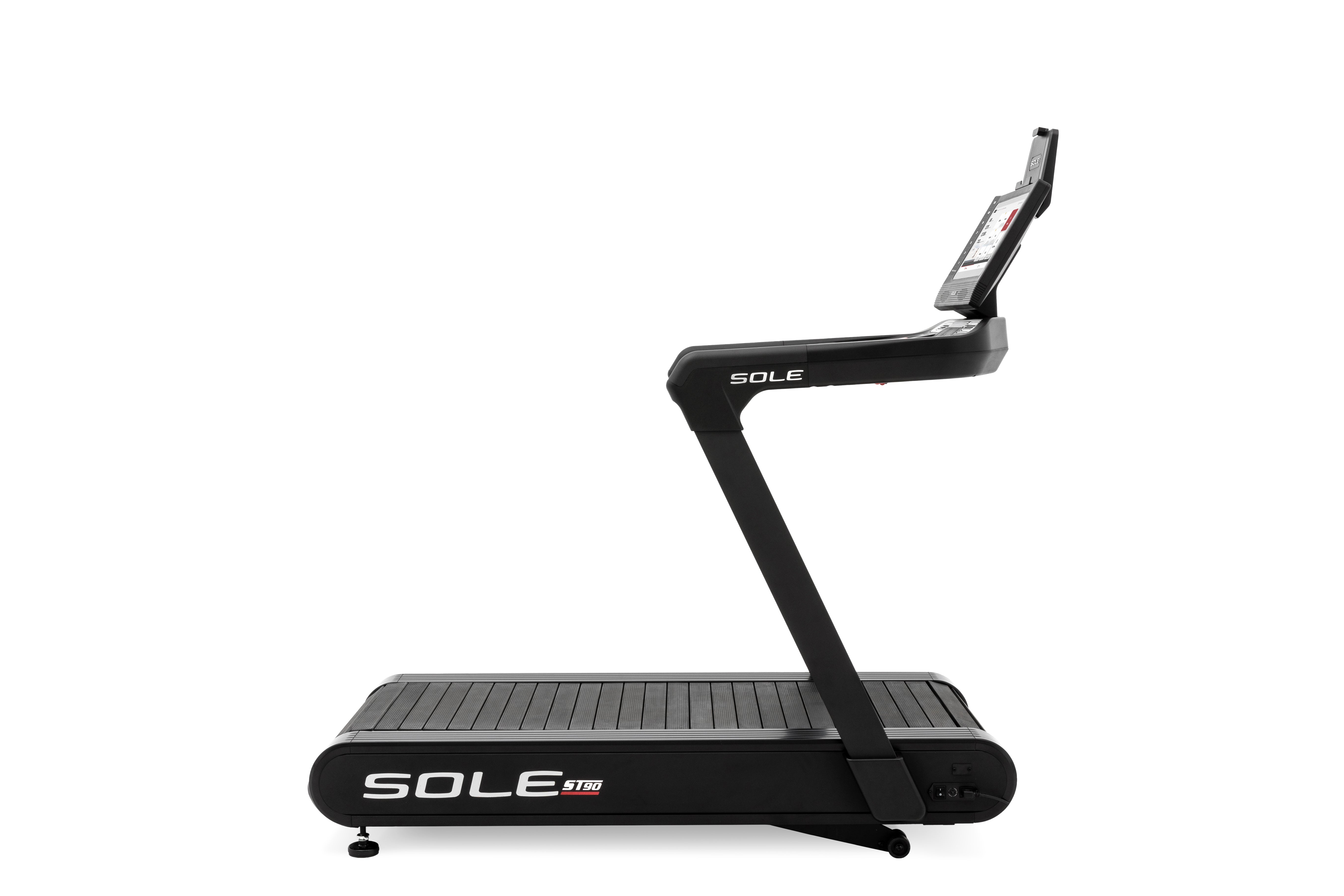 Angled view of the Sole ST90 treadmill showcasing its black frame, digital touchscreen console, branded running belt, and sturdy side arms, all against a white backdrop.