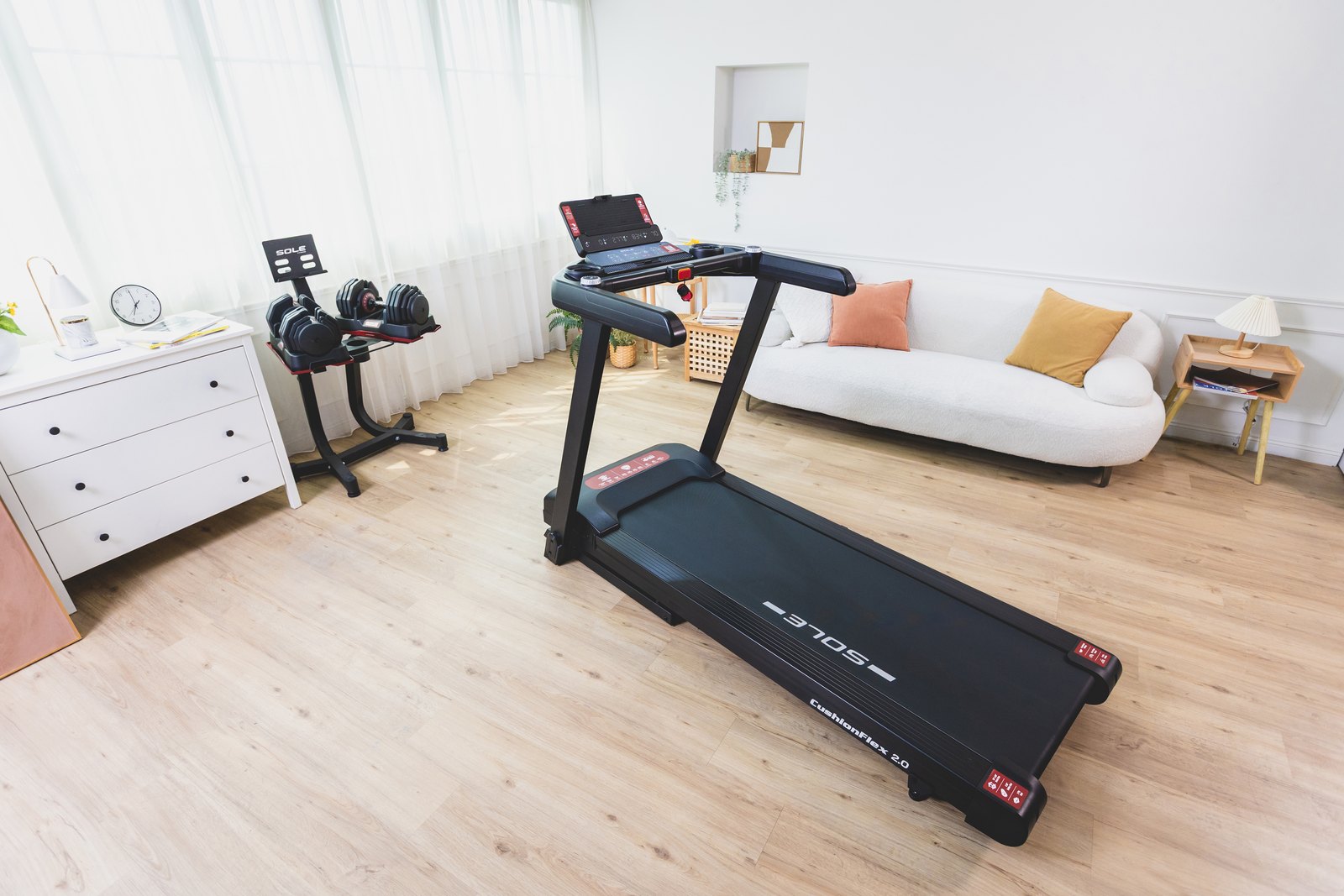 SOLE F63 treadmill in a bright home living room