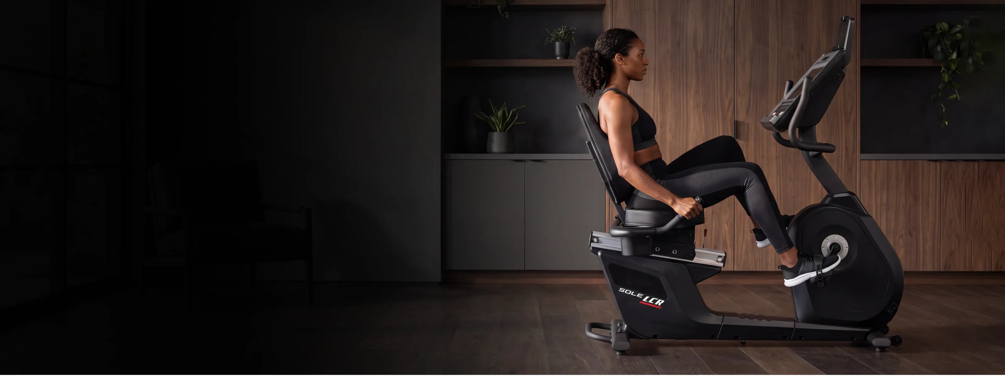 SOLE LCR recumbent bike in a modern home